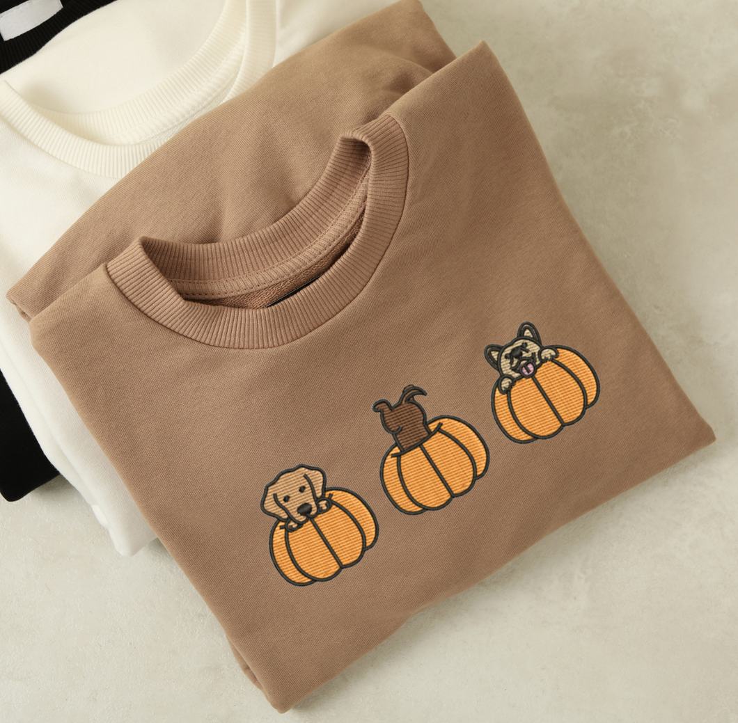 Dogs in a Pumpkin Fall Sweatshirt, Unisex & Embroidered